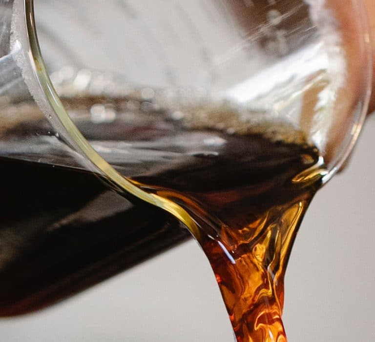 Coffee pouring into a glass