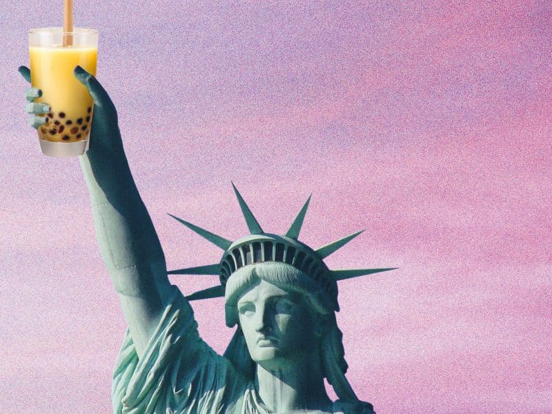 statue of liberty holding bubble tea